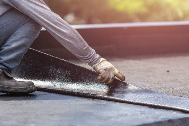 Professional Basement Waterproofing technician working in Elkwood, VA